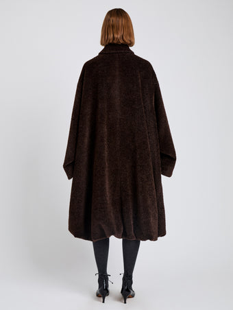 Proenza Schouler Back full length image of model wearing Verretta Coat In Alpaca Coating in Chocolate
