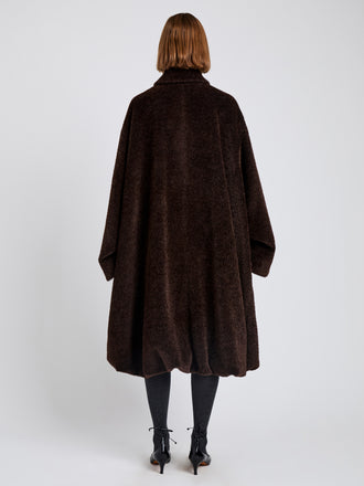 Proenza Schouler Back full length image of model wearing Verretta Coat In Alpaca Coating in Chocolate