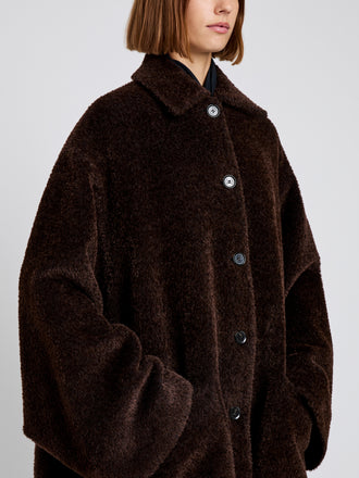 Proenza Schouler Detail image of model wearing Verretta Coat In Alpaca Coating in Chocolate