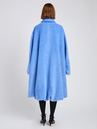 Proenza Schouler Back full length image of model wearing Verretta Coat In Alpaca Coating in Sky Blue