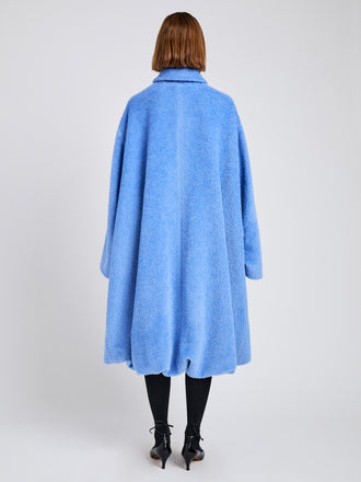 Proenza Schouler Back full length image of model wearing Verretta Coat In Alpaca Coating in Sky Blue