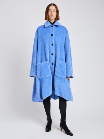 Proenza Schouler Front full length image of model wearing Verretta Coat In Alpaca Coating in Sky Blue