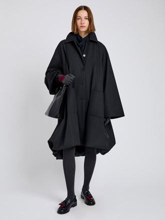 Proenza Schouler Front full length image of model wearing Verretta Coat In Coated Cotton in Black