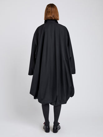 Proenza Schouler Back full length image of model wearing Verretta Coat In Coated Cotton in Black
