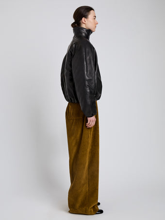 Proenza Schouler Side full length image of model wearing Laney Jacket In Semigloss Leather in Black