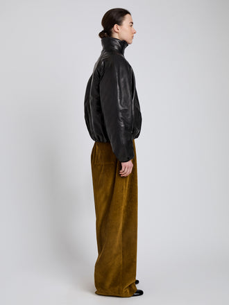 Proenza Schouler Side full length image of model wearing Laney Jacket In Semigloss Leather in Black
