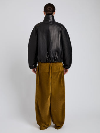 Proenza Schouler Back full length image of model wearing Laney Jacket In Semigloss Leather in Black