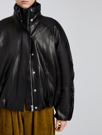 Proenza Schouler Detail image of model wearing Laney Jacket In Semigloss Leather in Black