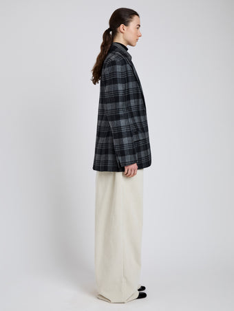 Proenza Schouler Side full length image of model wearing Daria Jacket In Plaid Wool Suiting in Grey Multi