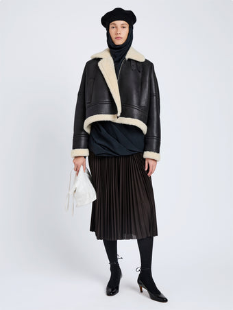 Proenza Schouler Front full length image of model wearing Alya Jacket In Shearling in Black, white