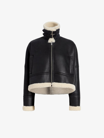 Proenza Schouler Still life image of Alya Jacket In Shearling in Black, white with collar buckled