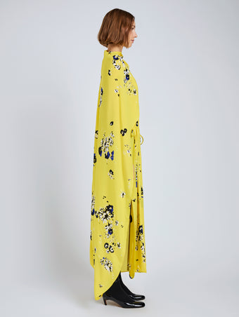 Proenza Schouler Side full length image of model wearing Ysabelle Dress In Printed Silk Viscose in Yellow Multi