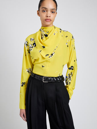 Proenza Schouler Detail image of model wearing Ysabelle Top In Printed Silk Viscose in Yellow Multi