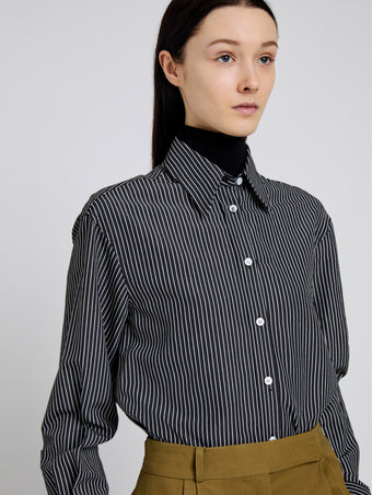 Proenza Schouler Detail image of model wearing Lynsey Top in Viscose Striped Shirting in Black/White