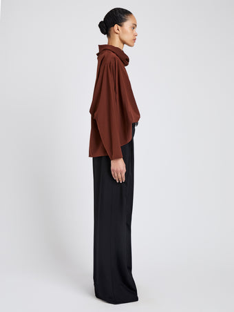Proenza Schouler Side full length image of model wearing Solene Top In Silk Viscose in Mahogany