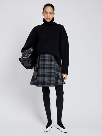 Proenza Schouler Front full length image of model wearing Cassia Skirt In Plaid Wool Suiting in Grey Multi