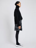 Proenza Schouler Side full length image of model wearing Cassia Skirt In Plaid Wool Suiting in Grey Multi