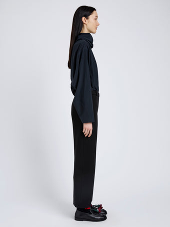 Proenza Schouler Side full length image of model wearing Ismene Pant In Wool Scuba in Black