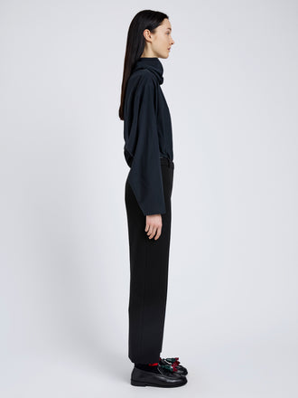 Proenza Schouler Side full length image of model wearing Ismene Pant In Wool Scuba in Black