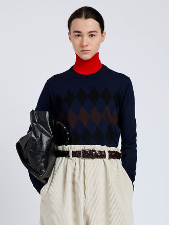 Proenza Schouler Front cropped image of model wearing Vivian Top In Argyle Knit in Navy Multi