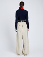 Proenza Schouler Back full length image of model wearing Vivian Top In Argyle Knit in Navy Multi