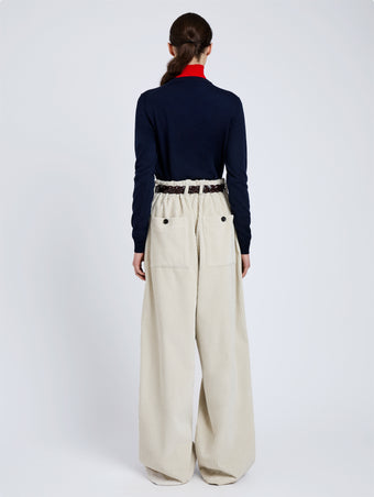 Proenza Schouler Back full length image of model wearing Vivian Top In Argyle Knit in Navy Multi