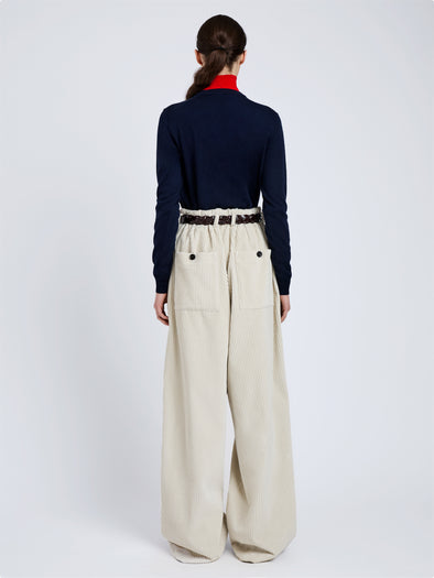 Proenza Schouler Back full length image of model wearing Vivian Top In Argyle Knit in Navy Multi