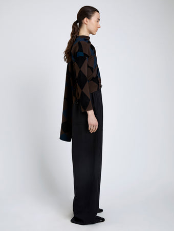 Proenza Schouler Side full length image of model wearing Vanne Top In Argyle Velvet Knit in Navy Multi
