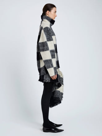 Proenza Schouler Side full length image of model wearing Kai Top In Brushed Glenplaid Knit in Black Multi