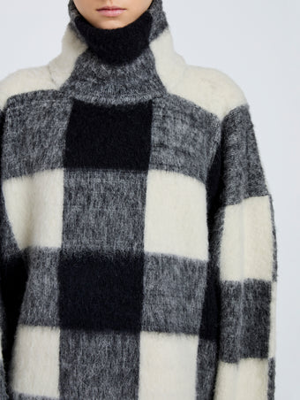 Proenza Schouler Detail image of model wearing Kai Top In Brushed Glenplaid Knit in Black Multi