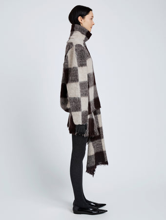 Proenza Schouler Side full length image of model wearing Kai Top In Brushed Glenplaid Knit in Brown Multi