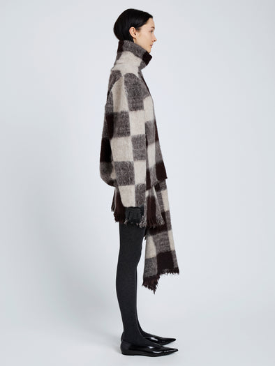 Proenza Schouler Side full length image of model wearing Kai Top In Brushed Glenplaid Knit in Brown Multi