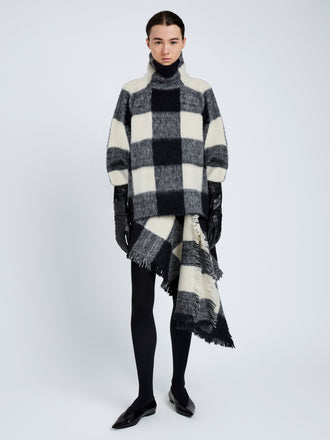 Proenza Schouler Front full length image of model wearing Kai Skirt In Brushed Glenplaid Knit in Black Multi