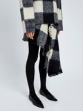 Proenza Schouler Detail image of model wearing Kai Skirt In Brushed Glenplaid Knit in Black Multi