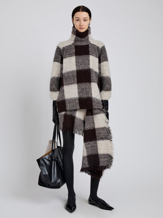 Proenza Schouler Front full length image of model wearing Kai Skirt in Brushed Glenplaid Knit in Brown Multi