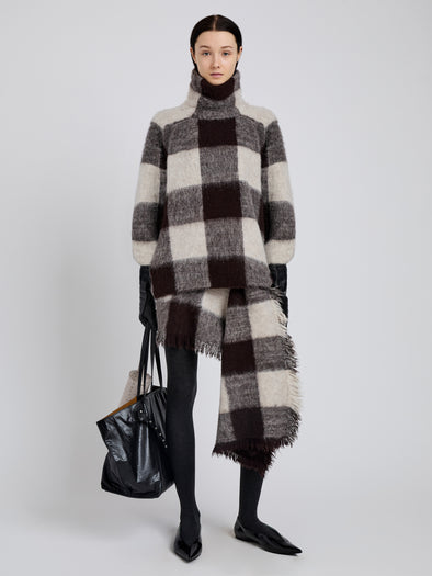 Proenza Schouler Front full length image of model wearing Kai Skirt in Brushed Glenplaid Knit in Brown Multi