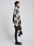 Proenza Schouler Side full length image of model wearing Kai Skirt in Brushed Glenplaid Knit in Brown Multi