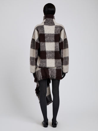 Proenza Schouler Back full length image of model wearing Kai Skirt in Brushed Glenplaid Knit in Brown Multi