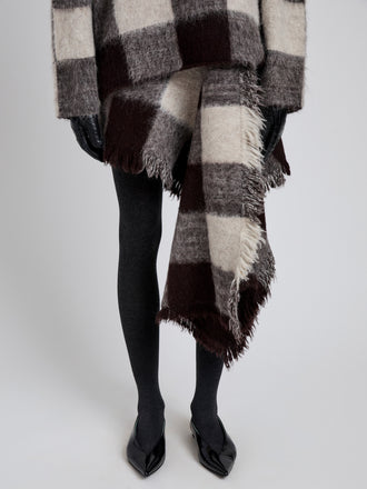 Proenza Schouler Detail image of model wearing Kai Skirt in Brushed Glenplaid Knit in Brown Multi