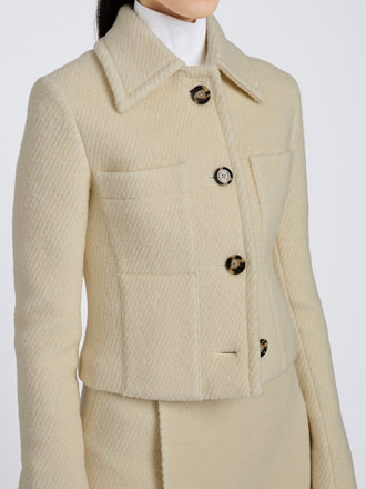 Proenza Schouler Detail image of model wearing Kinsley Jacket in Boucle Twill Suiting in Off White