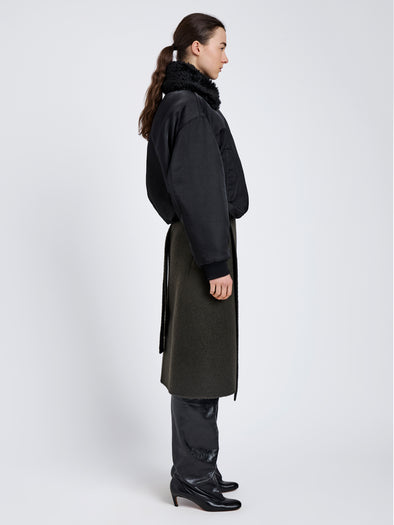 Proenza Schouler Side full length image of model wearing Vadra Jacket in Recycled Nylon Twill in Black