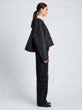 Proenza Schouler Side full length image of model wearing Ticiana Jackets in Double Wool Twill in Charcoal Melange