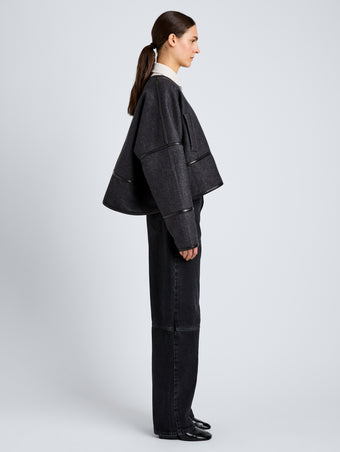 Proenza Schouler Side full length image of model wearing Ticiana Jackets in Double Wool Twill in Charcoal Melange