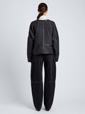 Proenza Schouler Back full length image of model wearing Ticiana Jackets in Double Wool Twill in Charcoal Melange
