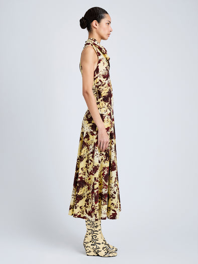 Proenza Schouler Side full length image of model wearing Adelide Dress in Printed Silk Viscose in Rust Multi