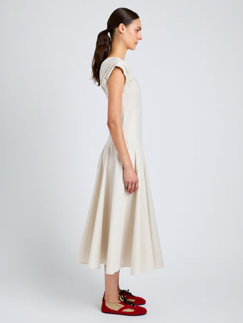 Proenza Schouler Side full length image of model wearing Manoela Dress in Eco Light Compact Poplin in White