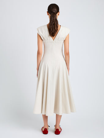 Proenza Schouler Back full length image of model wearing Manoela Dress in Eco Light Compact Poplin in White