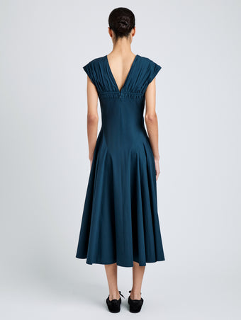Proenza Schouler Back full length image of model wearing Manoela Dress in Eco Light Compact Poplin in Dark Spruce