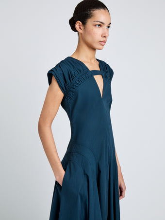Proenza Schouler Detail image of model wearing Manoela Dress in Eco Light Compact Poplin in Dark Spruce