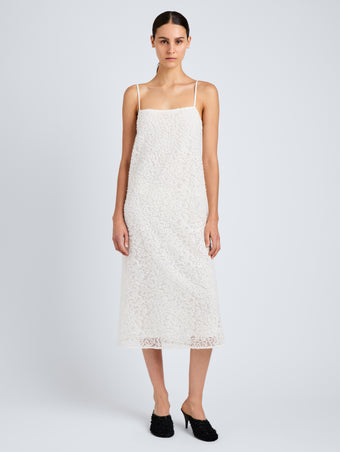 Proenza Schouler Front full length image of model wearing Virginie Dress in Fringe Embroidery in Off White